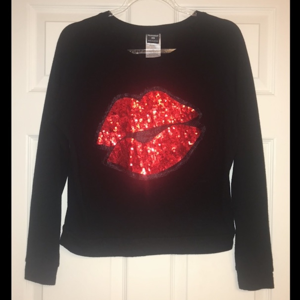 Black and red sequined lips sweater
